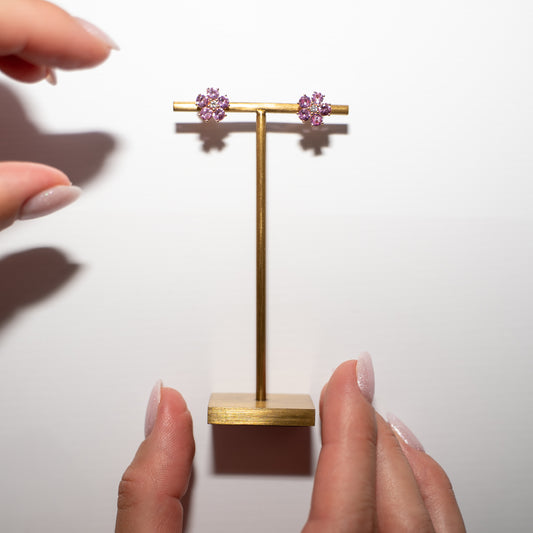Pink Sapphire Flower Earrings with diamonds and hands for reference - Amilla Jewelry