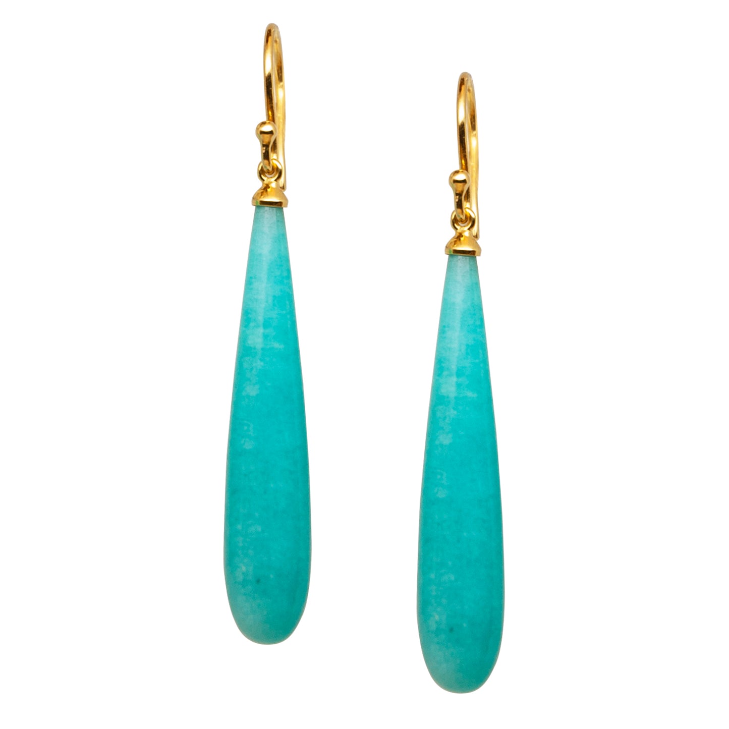 Pair of turquoise teardrop earrings with gold hooks on a light background